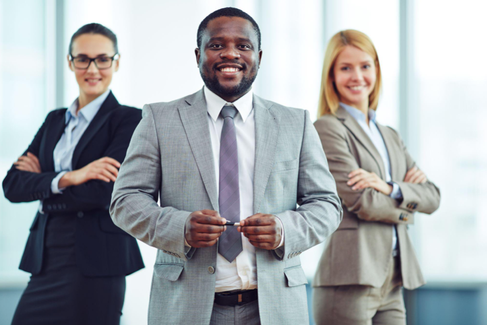 Coworkers with positive attitudes; image by pressfoto, via Freepik.com.