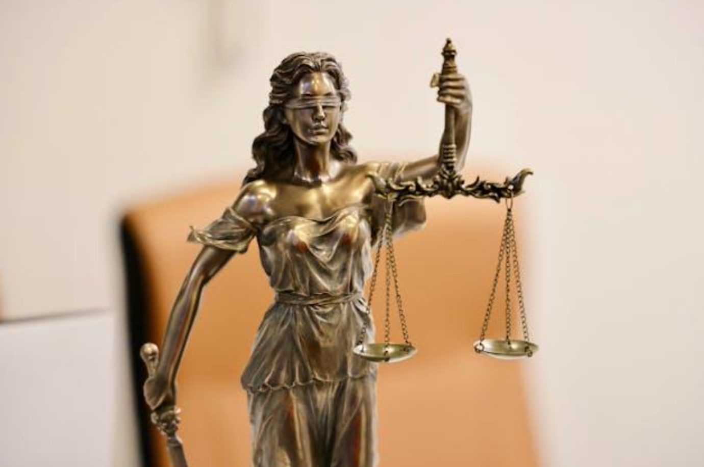 Statue of Lady Justice with Scales; image by deep Bhullar, via Pexels.com.