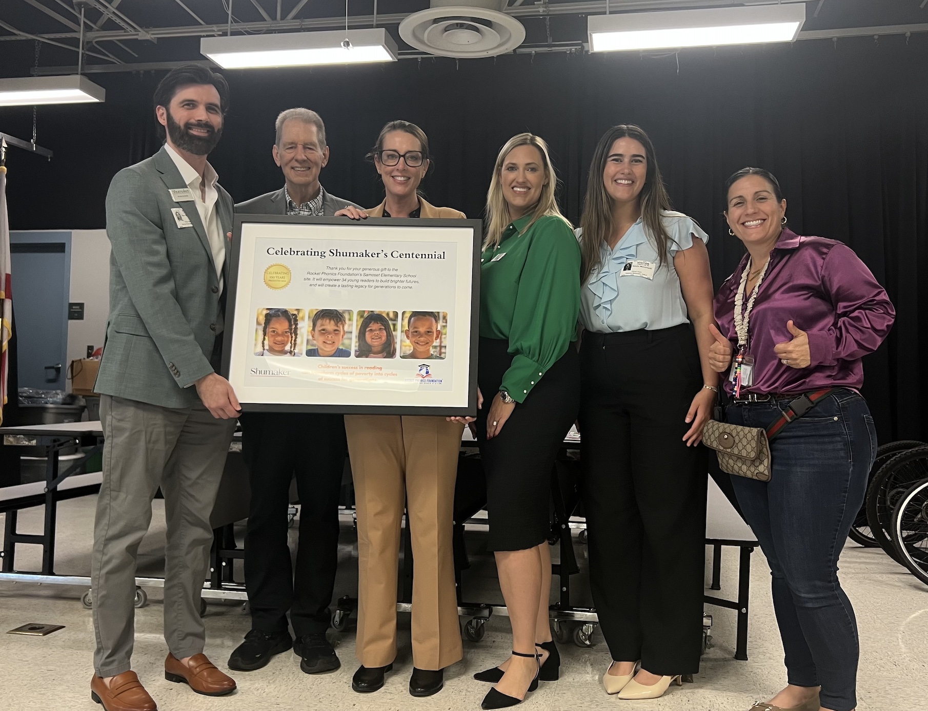 Group photo (left to right): Shumaker Associate Ryan Guerin, Dr. Stephen Guffanti - President of RocketPhonics, Laurie Breslin - Manatee County School District Superintendent, Hanna Lindsay, Natalia Augustine, and Samantha Webb - Samoset Elementary Principal. Image courtesy of Shumaker.