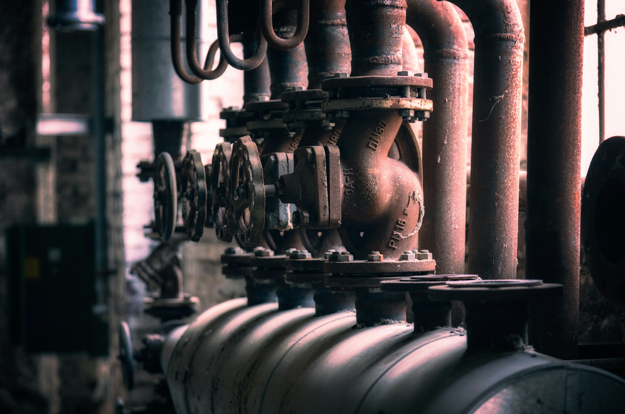 Metal pipes; image by Peter Herrmann, via Unsplash.com.