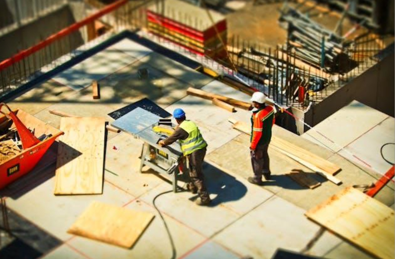 Two men working on a construction site; image by Pixabay, via Pexels.com.