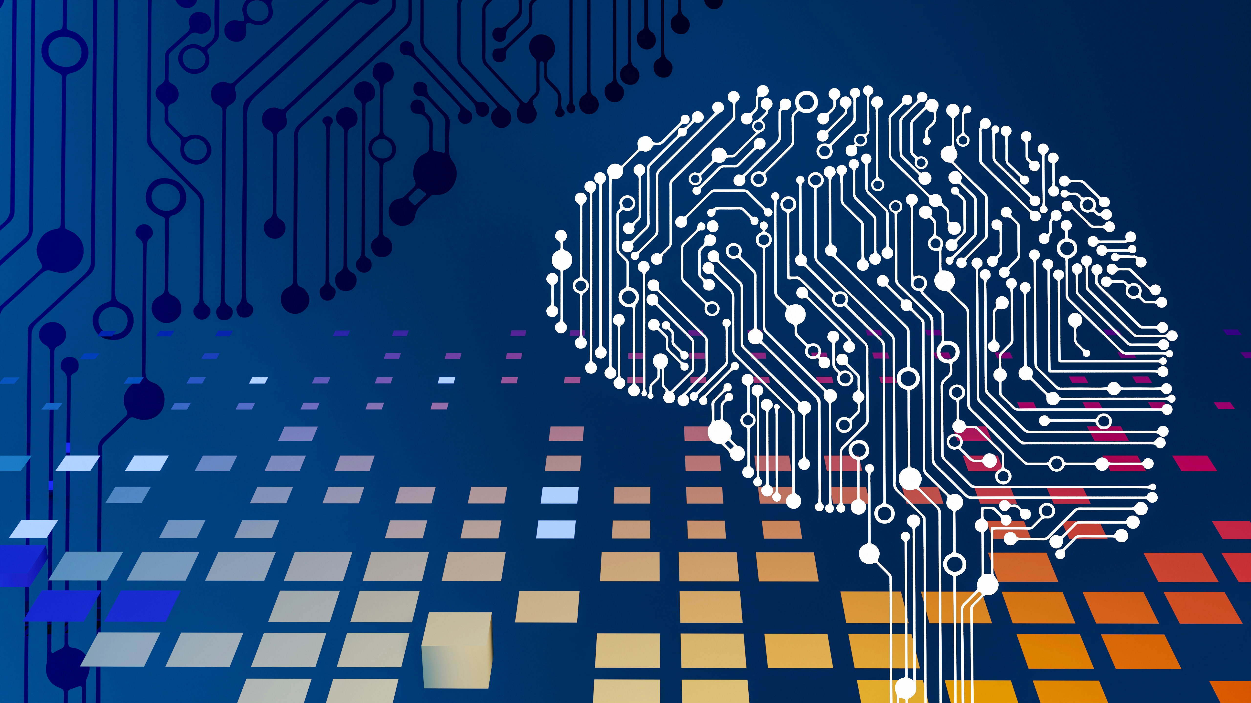A computer circuit board with a brain on it; image by Steve A. Johnson, via Unsplash.com.